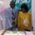 Mr. Danso assists madam with cutting the cake